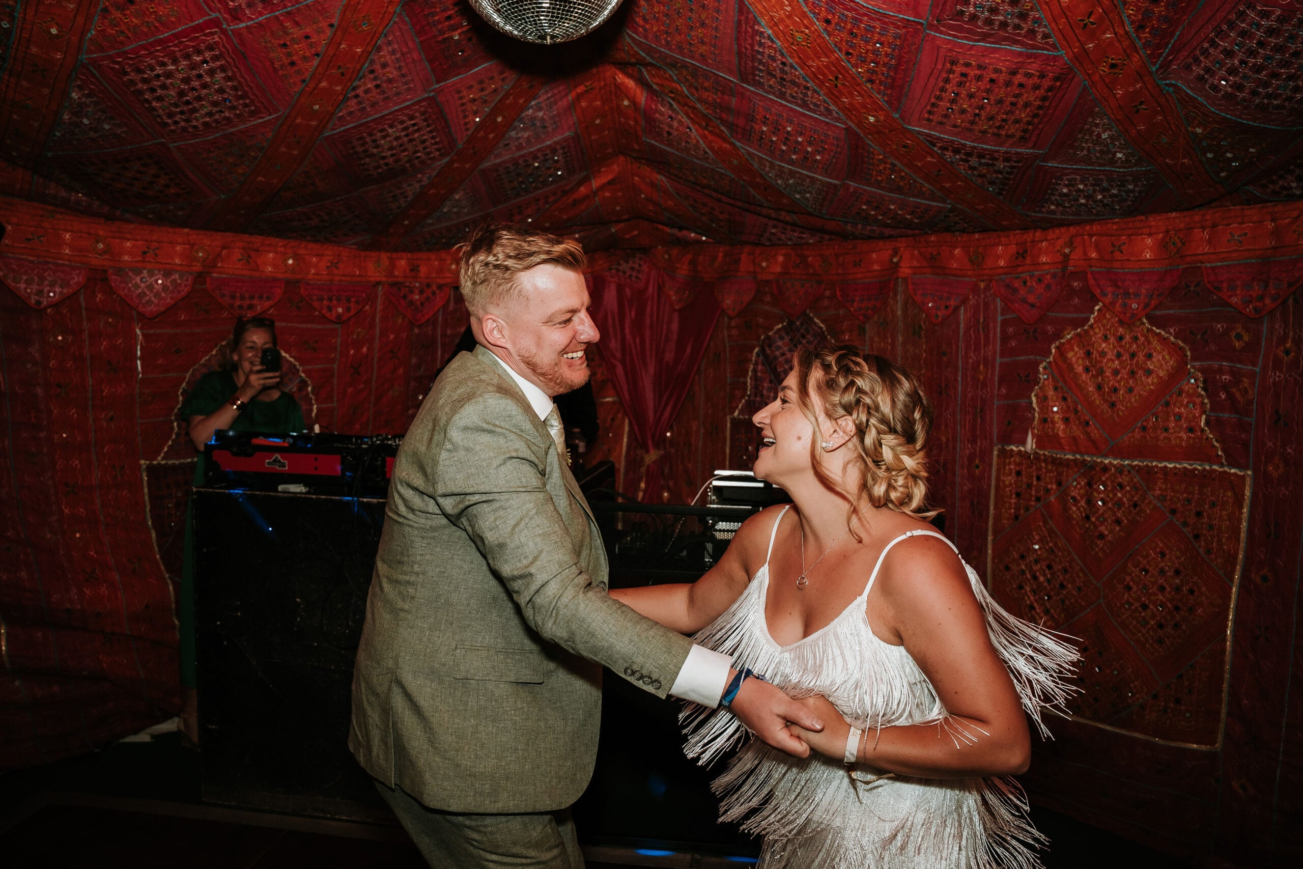 A couple dancing inside an Arabian Tents marquee
