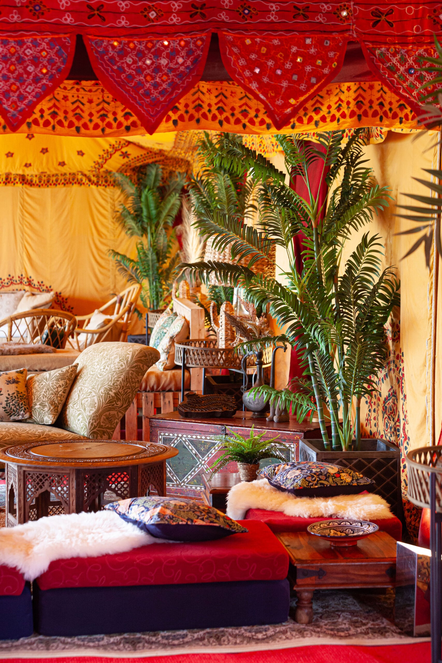 An intimate, candlelit marquee dinner setting