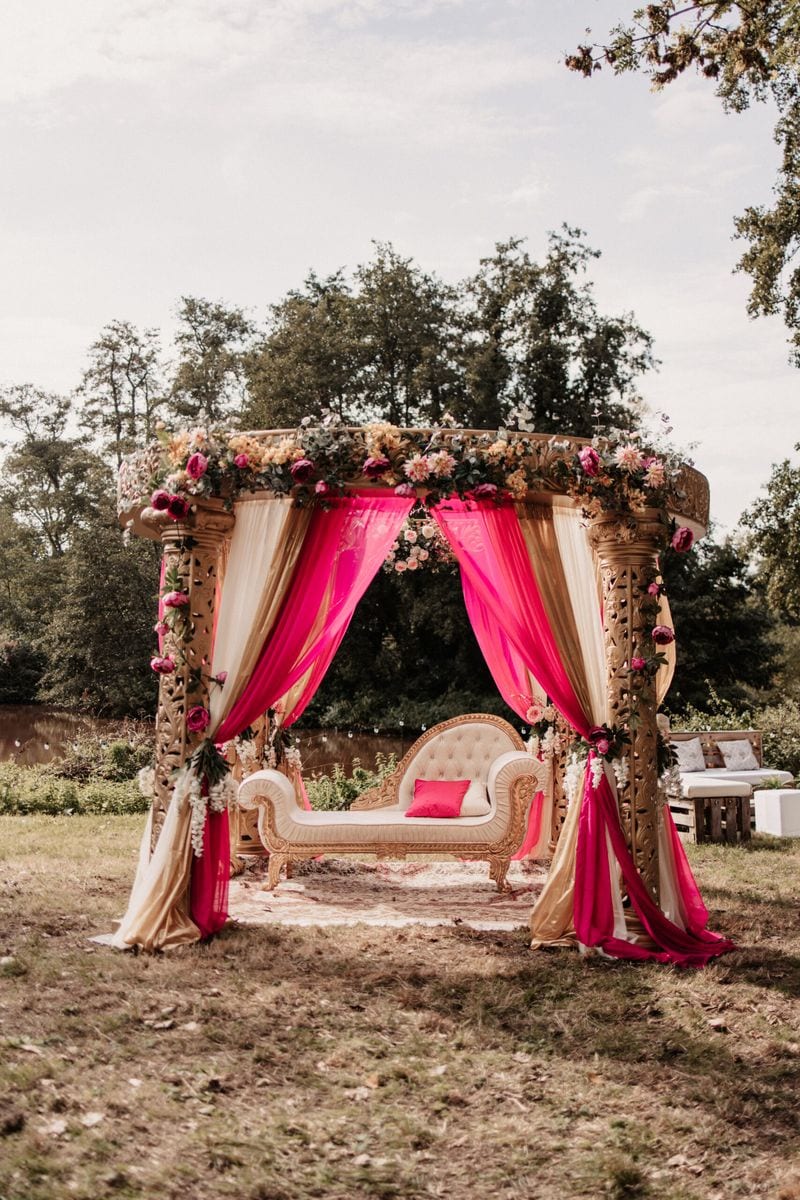 White and gold mandap with draping (flowers not included)