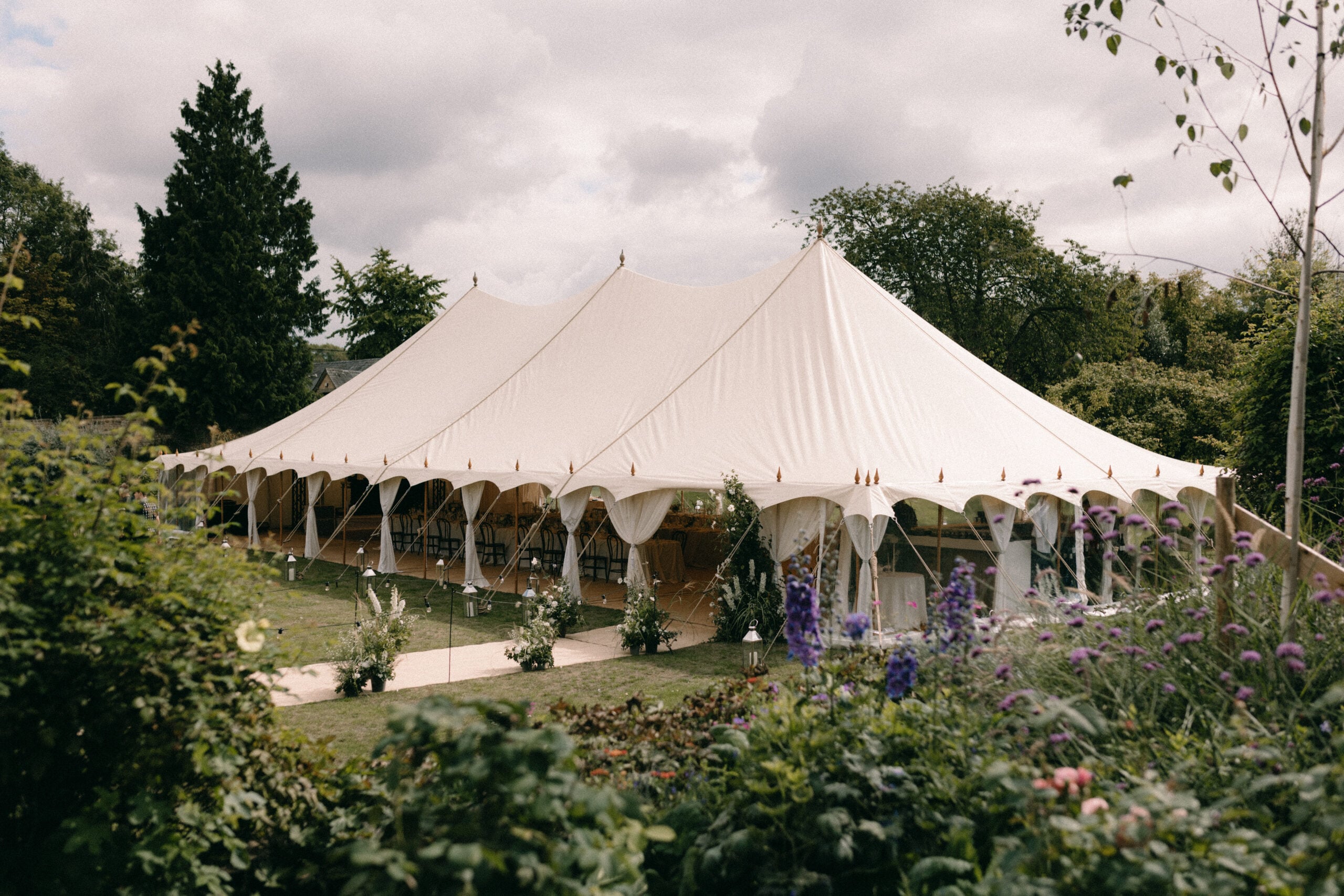 A beautifully dressed Arabian Tents wedding marquee at dusk