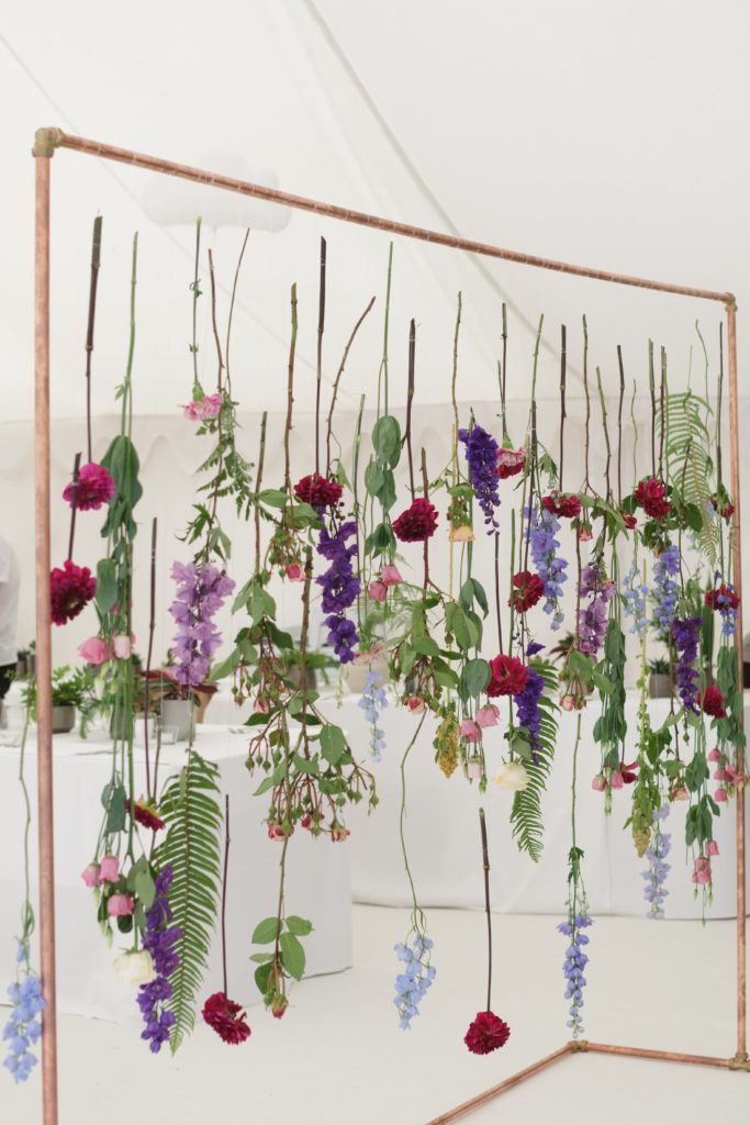 Greenery wedding theme with suspended flowers
