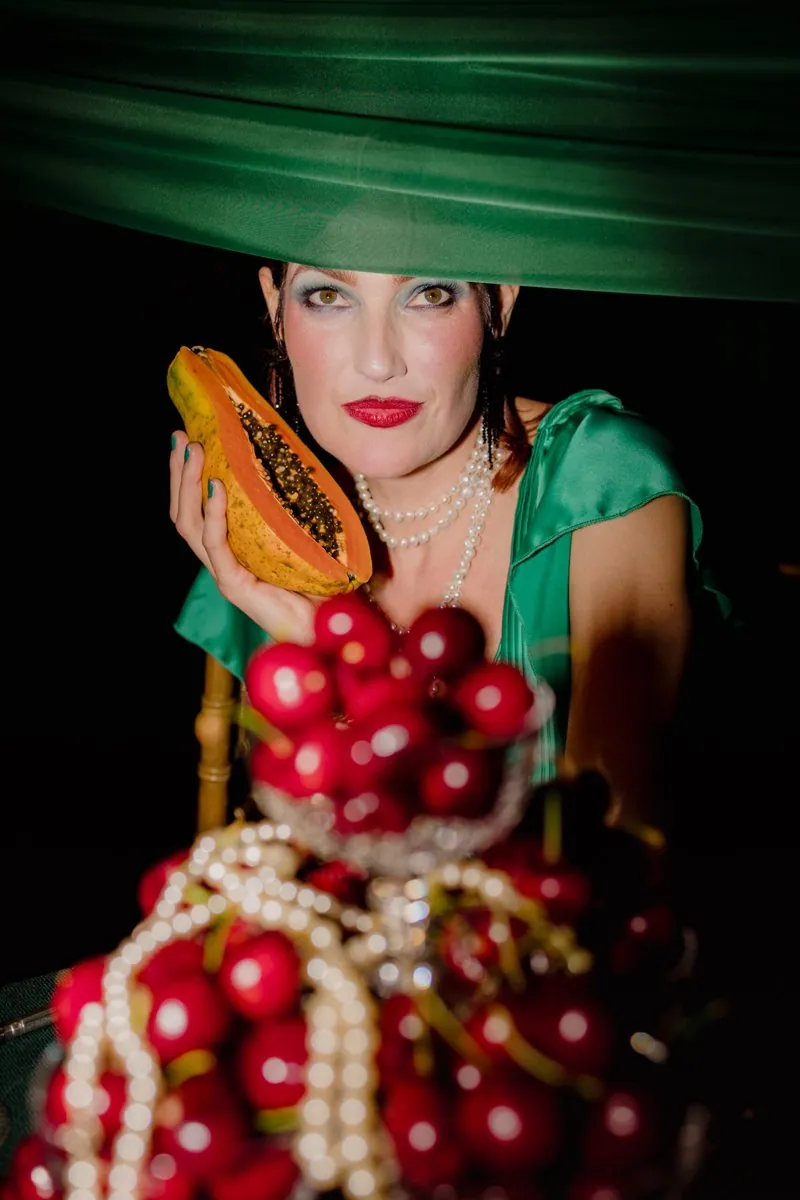 Wickedly Bound: A Study in Opulence Inside a Green Velvet Marquee